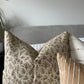 Textured fabric cushion with leaf pattern 